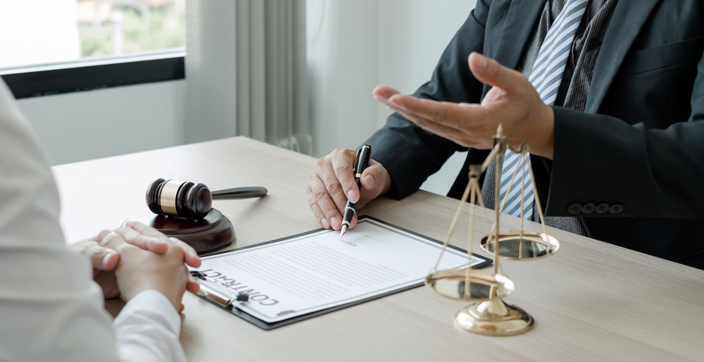 Lawsuit document file with lawyer work at law firm. Legal consulting concept.